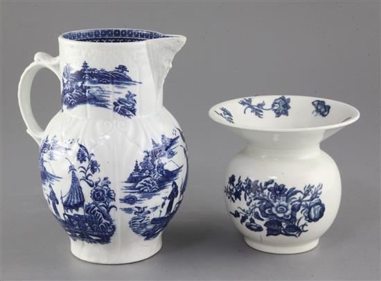 A Caughley blue and white floral spittoon, c.1780 and a Caughley fisherman and cormorant pattern mask jug, height 12cm and 18cm